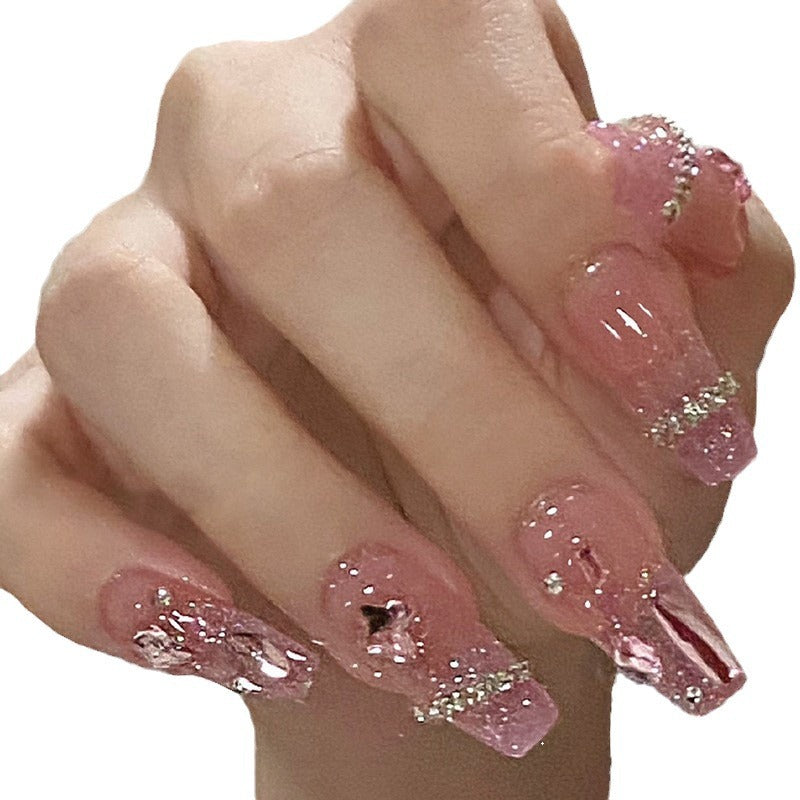 Artificial nails with heart design and glitter accents Kalsten