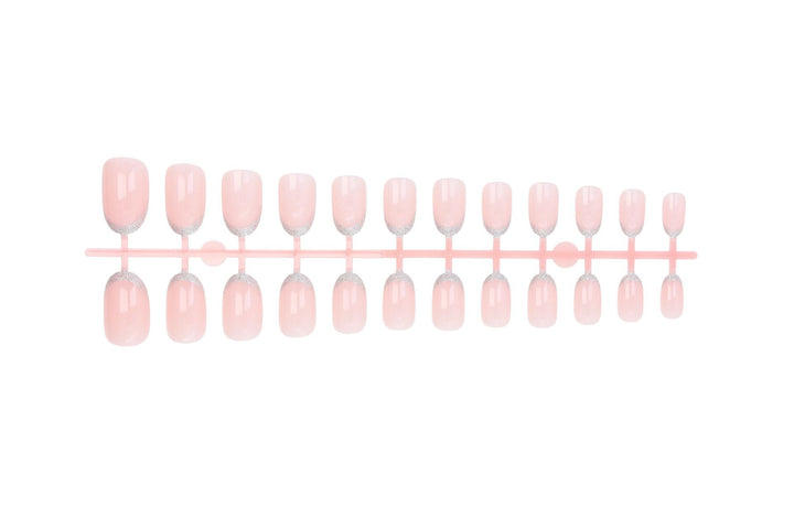 Acrylic nail set with elegant French tip and glitter accents Kalsten