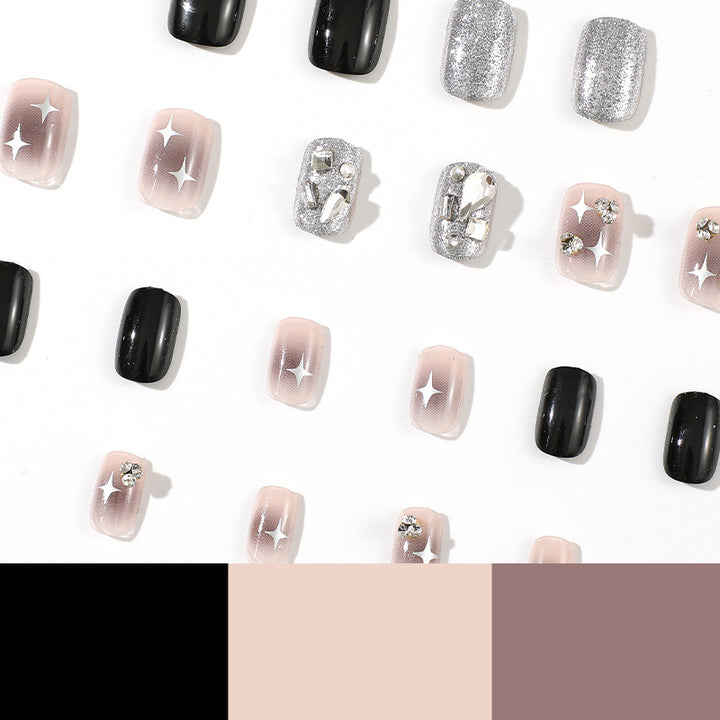 Elegant Nail Art with Glitter and Star Motifs Kalsten