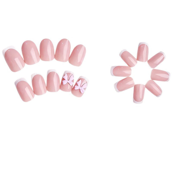 Exclusive artificial nails with decorative bows and pearl details Kalsten