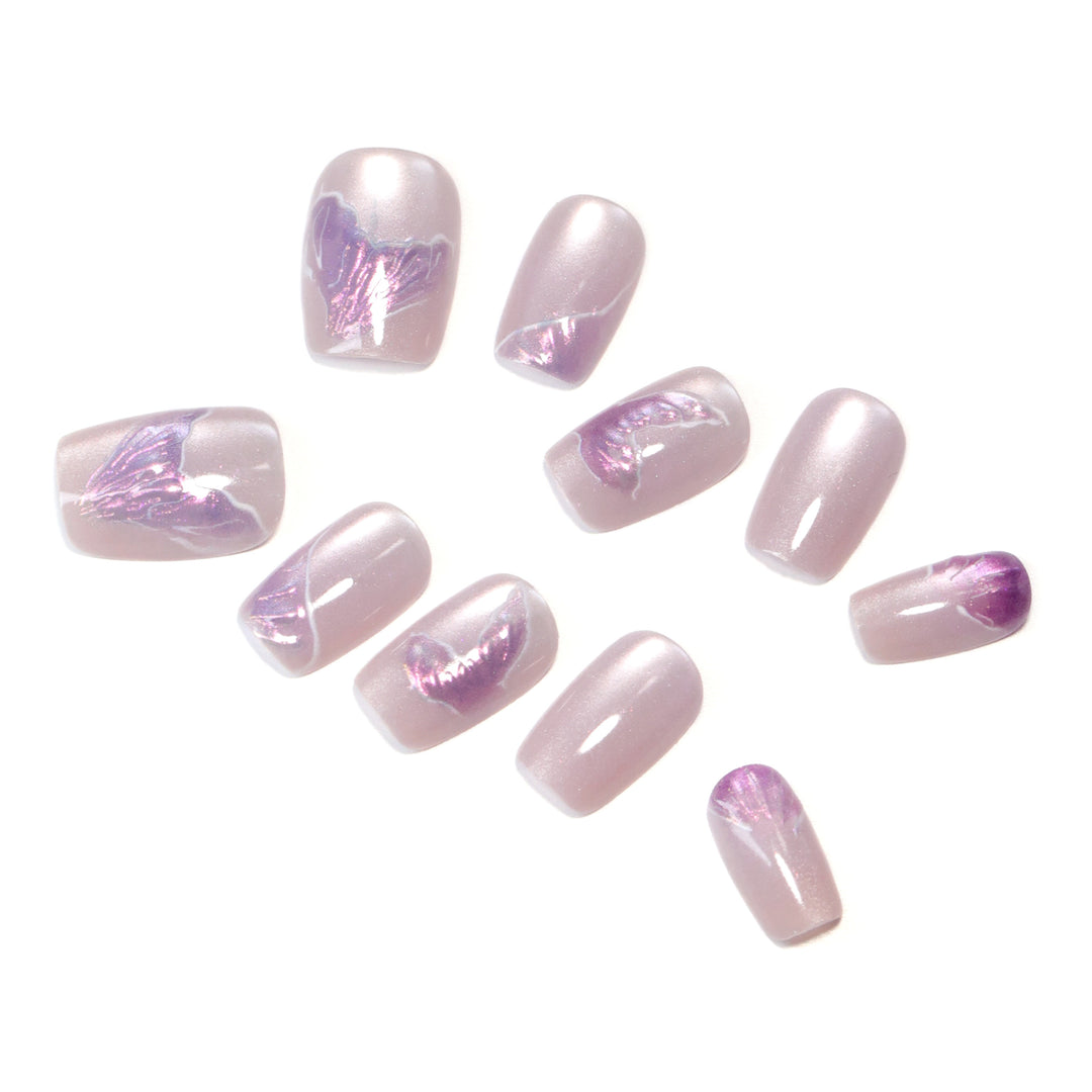 Artfully designed nail extensions with elegant flower motifs Kalsten