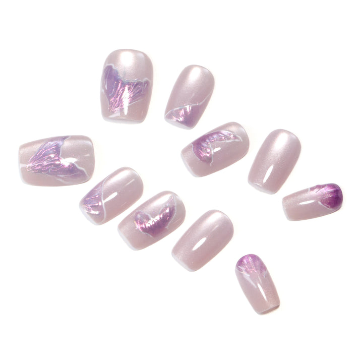 Artfully designed nail extensions with elegant flower motifs Kalsten