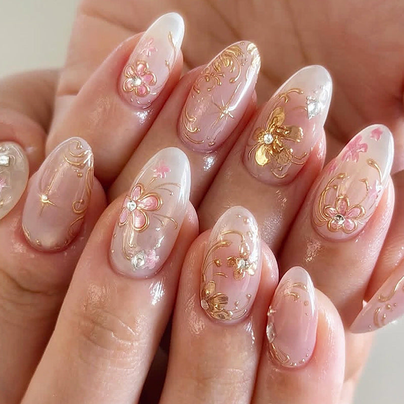 Nail art set with floral and golden details Kalsten