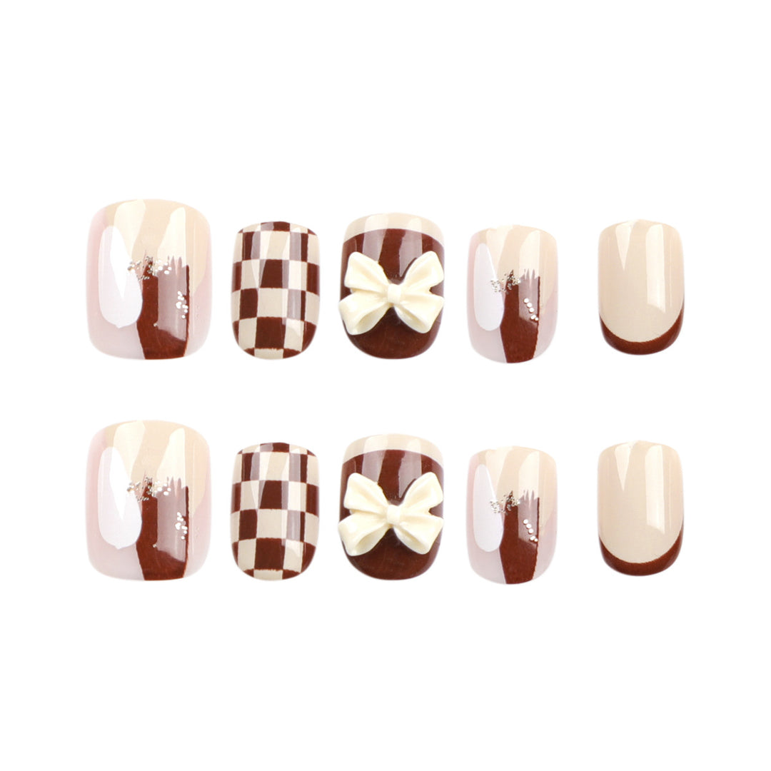 Creative Nail Art with Modern Patterns and Bow Motifs Kalsten