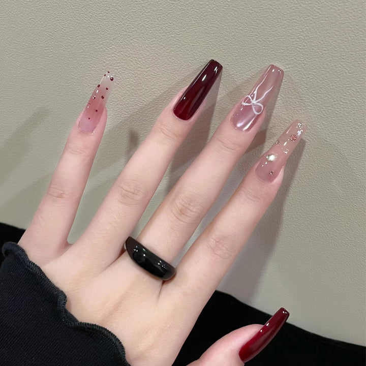 Artistic Long Press-On Nails Set with Glossy and Decorative Accents Kalsten