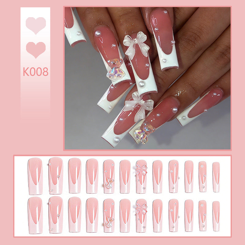 Elegant artificial nails with delicate bows and pearls Kalsten