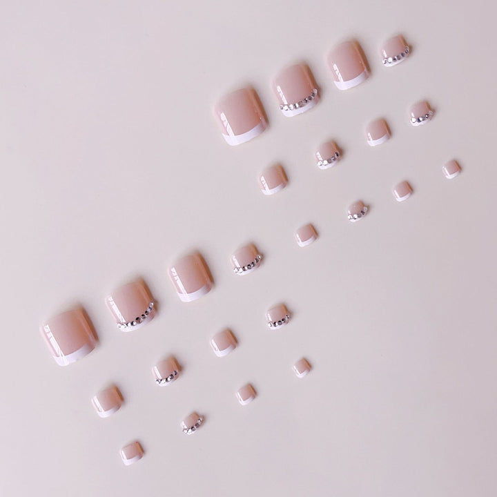 Nail art set with elegant French design and sparkling accents Kalsten
