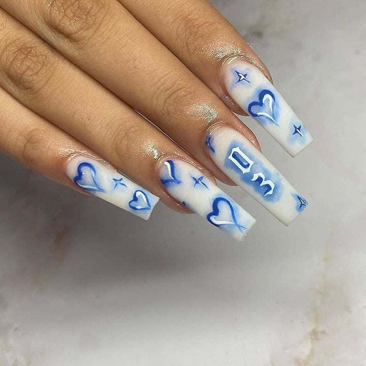 Artful Nail Extensions with heart-shaped and modern designs Kalsten
