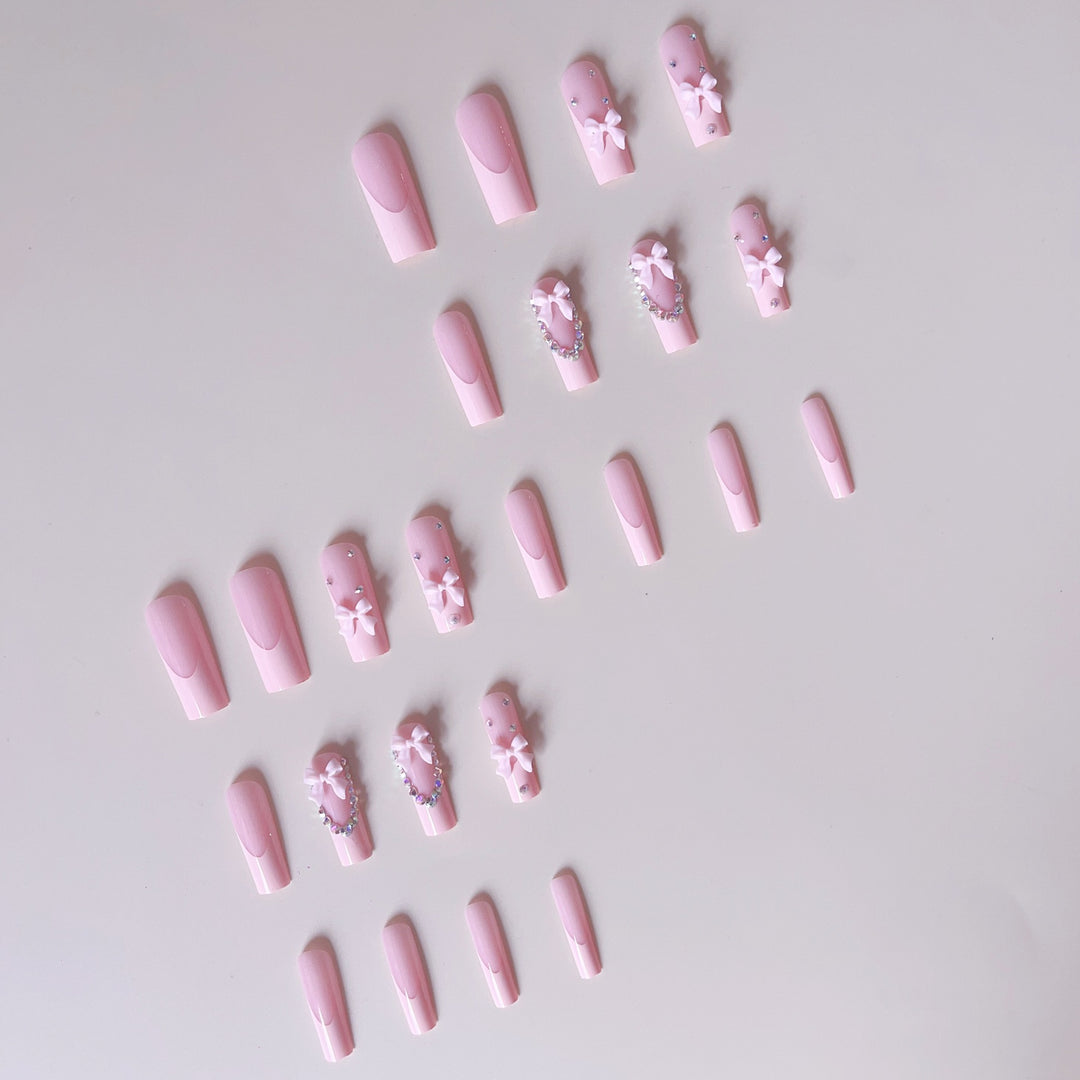 Nail art set with delicate arch decorations and rhinestone details Kalsten