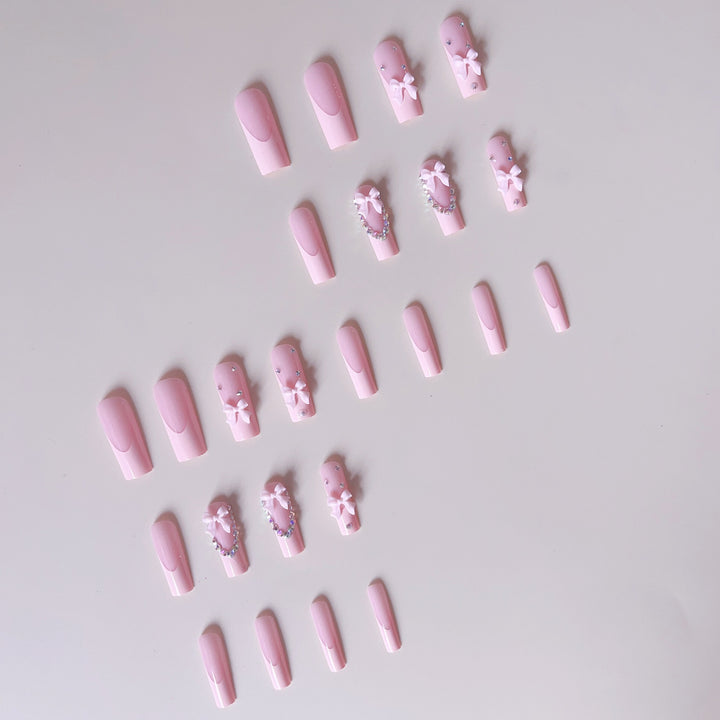 Nail art set with delicate arch decorations and rhinestone details Kalsten