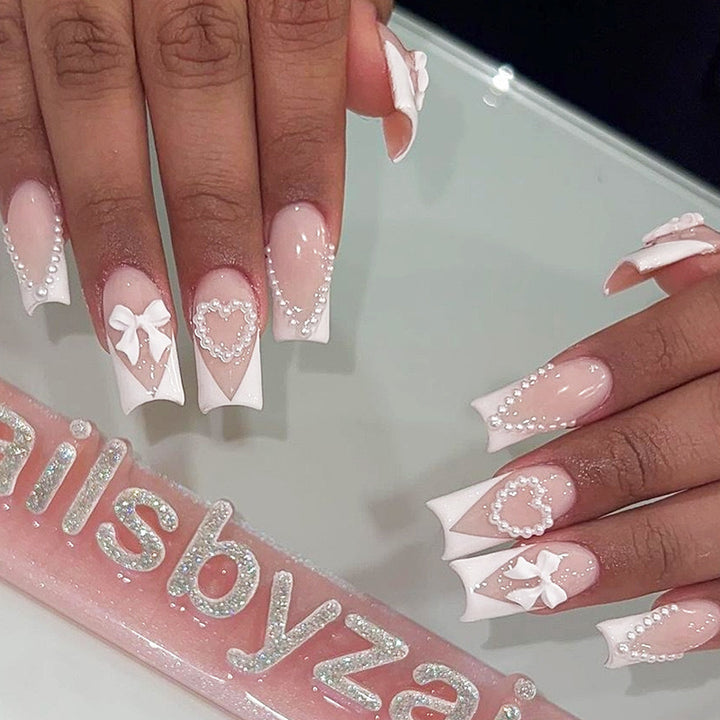 Artificial nail set with filigree hearts and bow decorations Kalsten