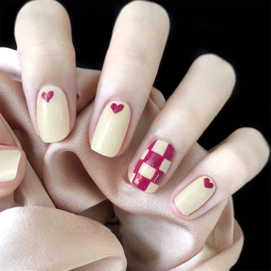 Trendy Nail Art with Heart and Checkered Patterns Kalsten