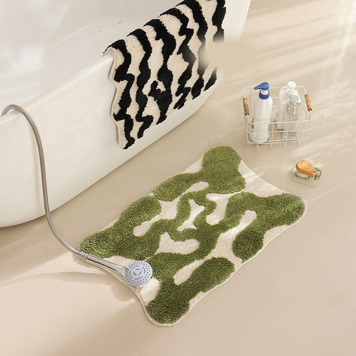 Hand-tufted bathroom bath mat with non-slip backing and textured square relief Kalsten