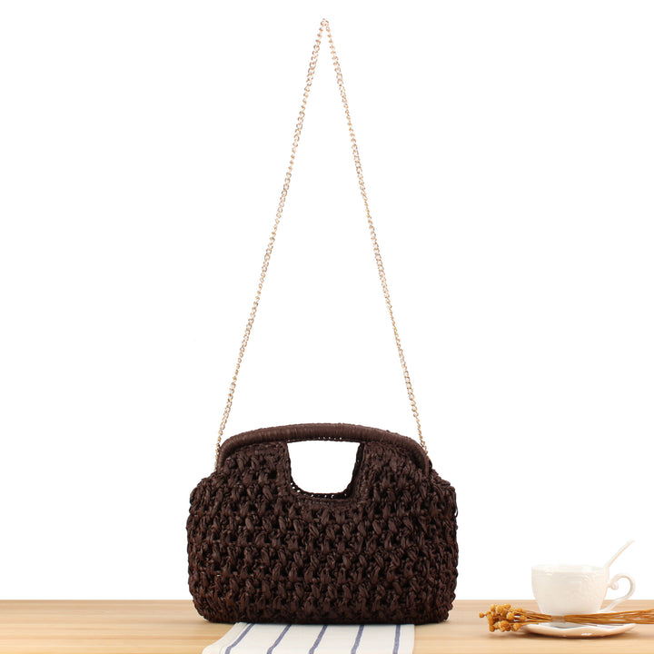 Handbag made of naturally untreated woven material with elegant chain embellishment Kalsten