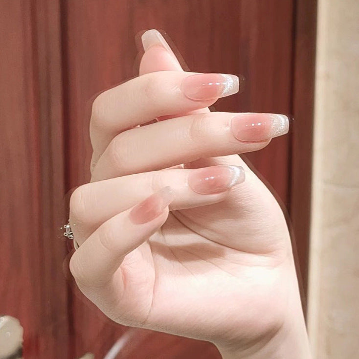 Nail set with elegant French design and sparkling accents Kalsten