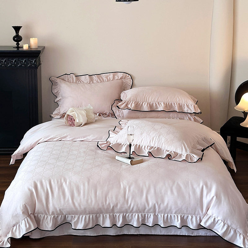 Luxurious cotton satin bedding set with ruffles and contrasting piping