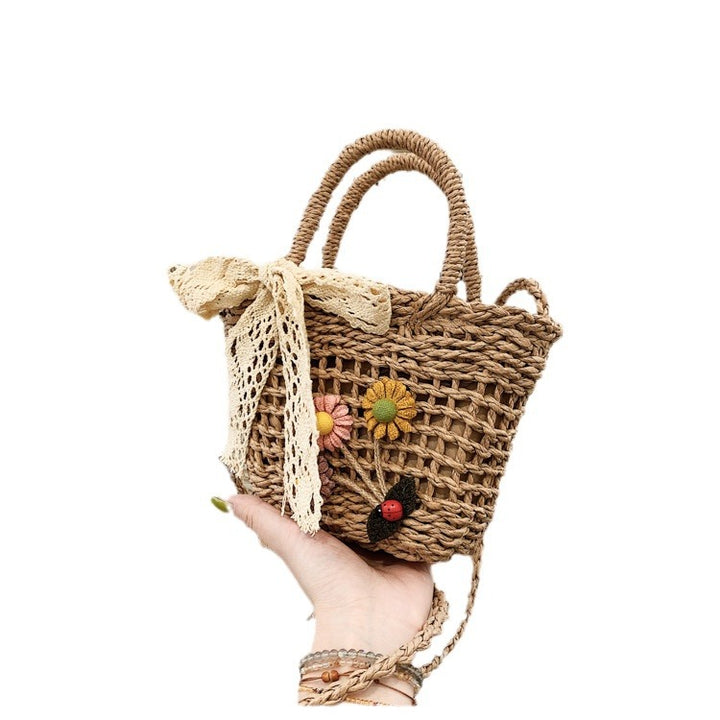 Playful basket bag with floral accents Kalsten