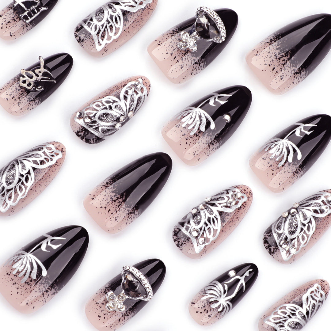 Artful stiletto nails with delicate embellishments and glamour accents Kalsten
