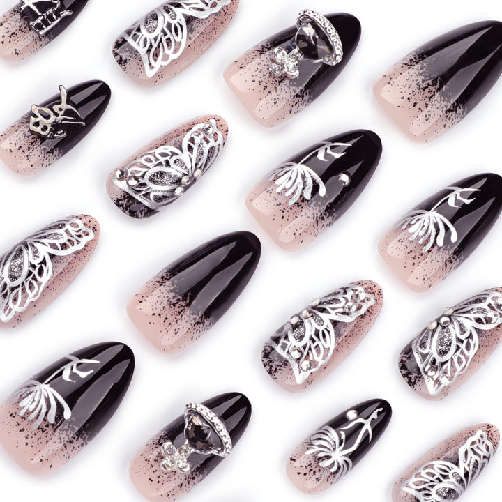Artful stiletto nails with delicate embellishments and glamour accents Kalsten