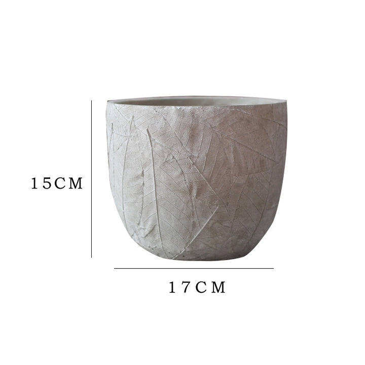 Decorative plant container made of handmade ceramic with leaf pattern Kalsten