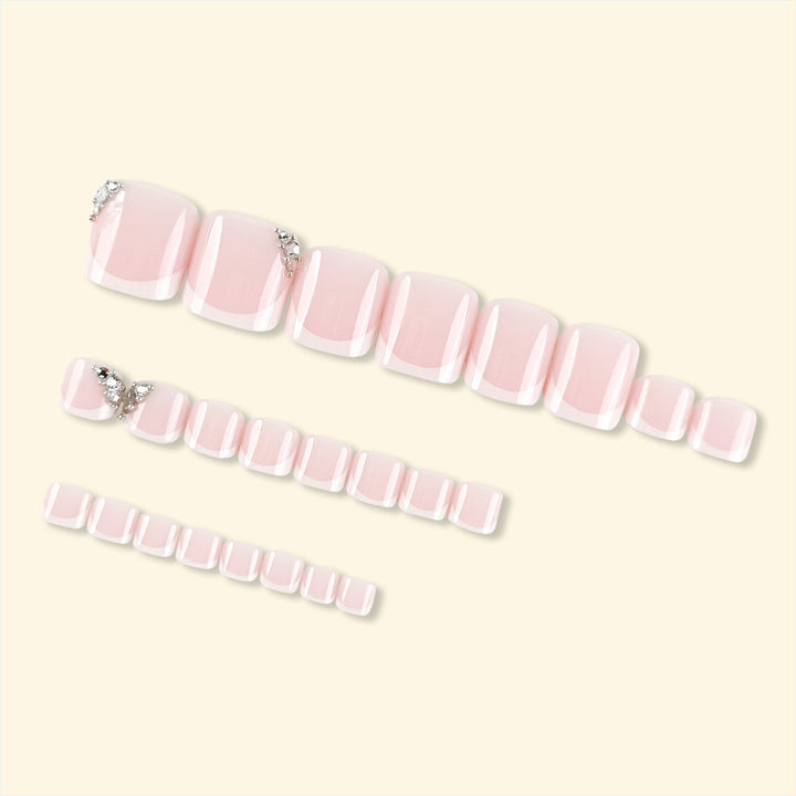 Artificial nail set with elegant French manicure and glitter accents Kalsten
