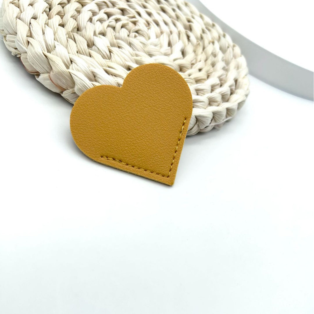 Heart-Shaped Leather Accessory Kalsten