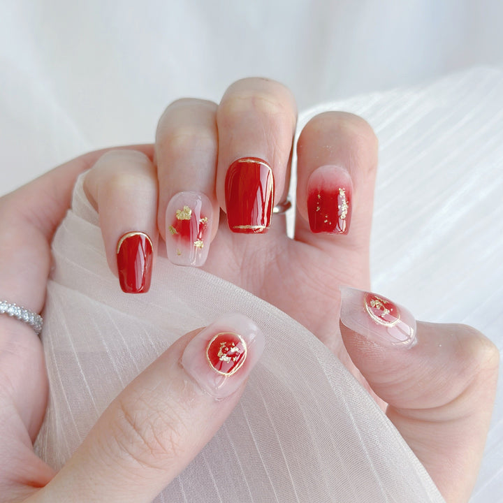 Artistic Press-On Nail Set with Floral and Golden Accents