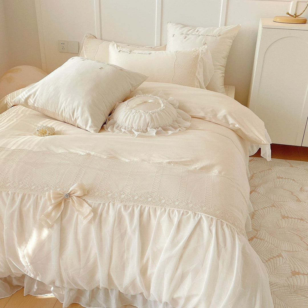Romantic ruffle duvet cover set with frill, bow appliqué and delicate embroidery