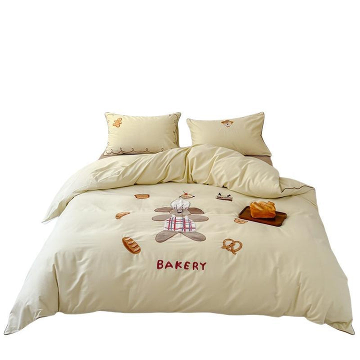Bedding set made of cotton satin with embroidered baker motif