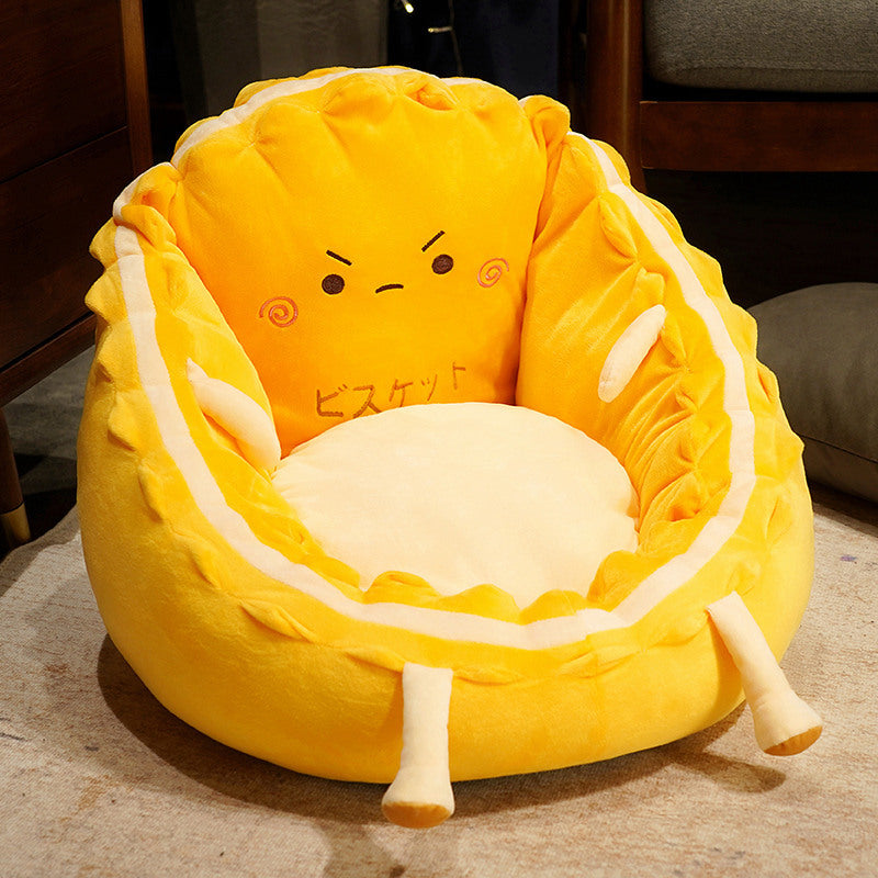 Plush pet bed with raised edge and removable cuddly pillow