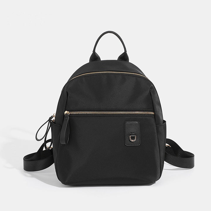 Compact Nylon Backpack with Multiple Pockets