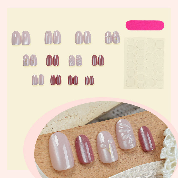Acrylic nail set with elegant high-gloss finish and creative embellishments Kalsten