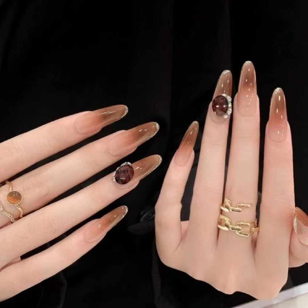 Glittering artificial nails with elegant tip design and crystal decoration Kalsten