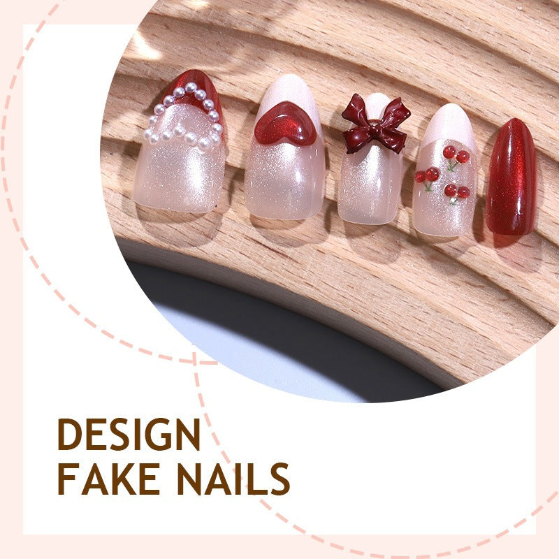 Artificial nail set with romantic heart design and sparkling accents Kalsten