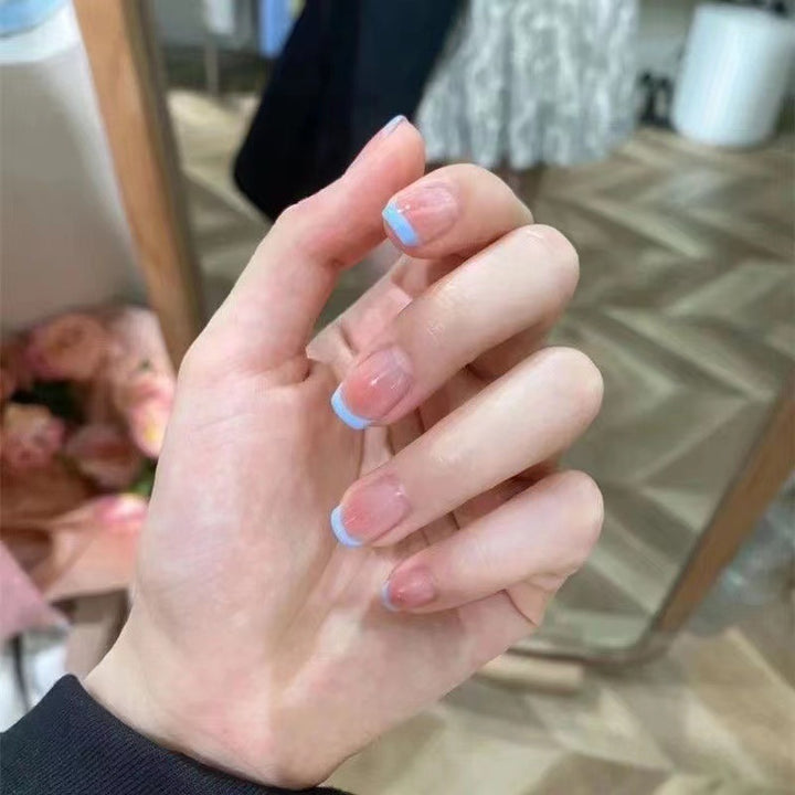 Elegant French Tip Press-On Nails with Unique Finish