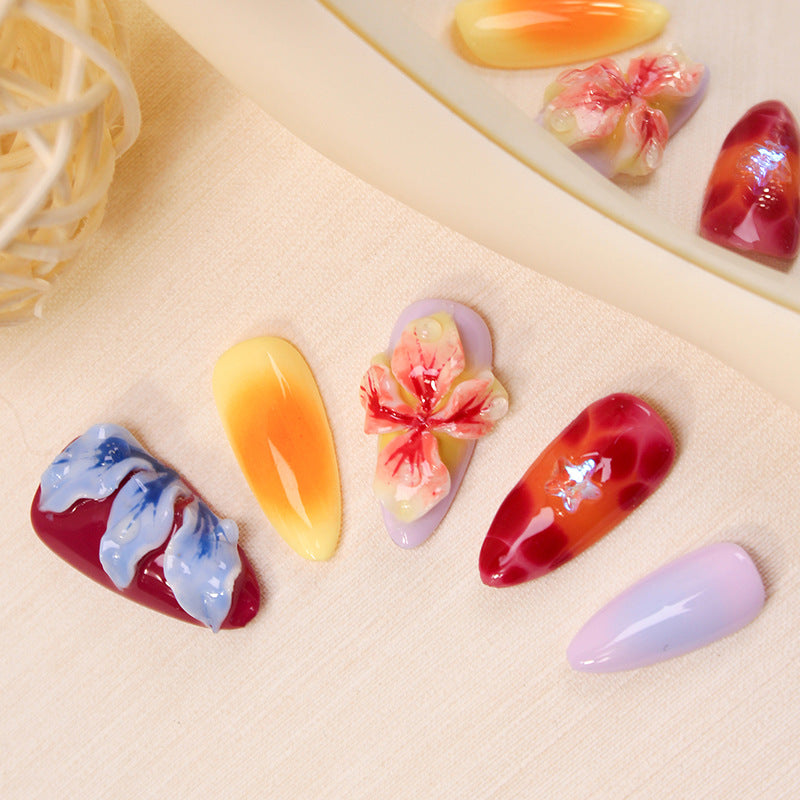 Artificial nail set with floral 3D accents and colorful designs Kalsten