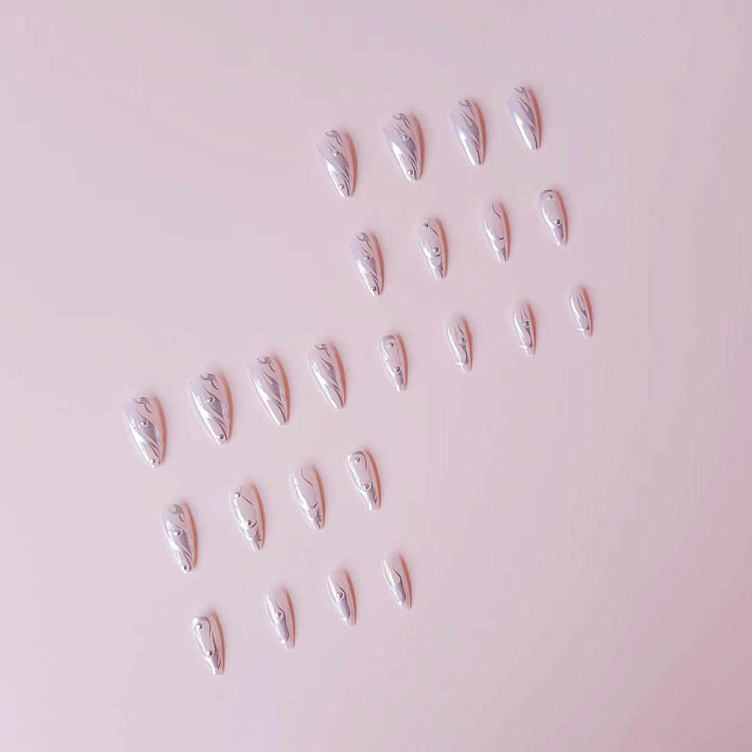 Nail set with elegant water drop design and 3D accents Kalsten
