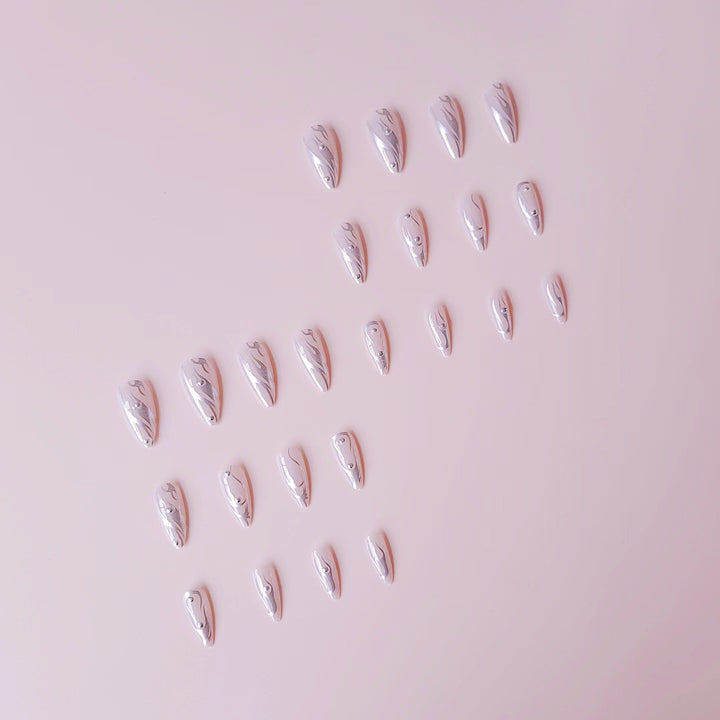 Nail set with elegant water drop design and 3D accents Kalsten