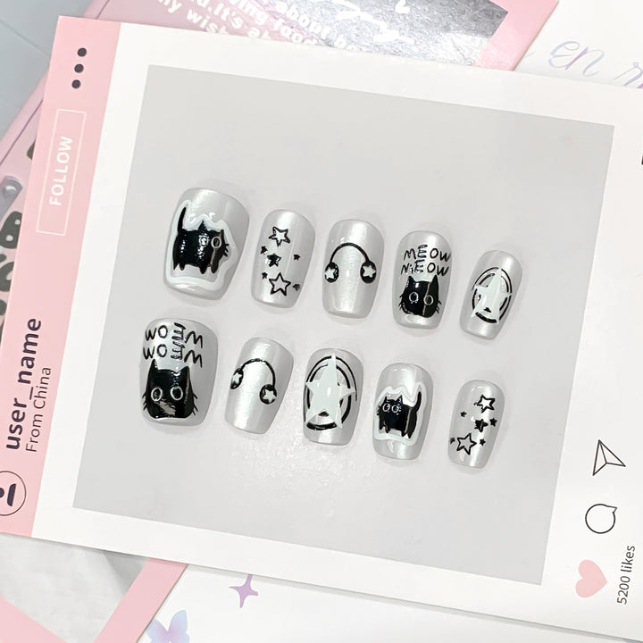 Playful nail art with cat motifs Kalsten