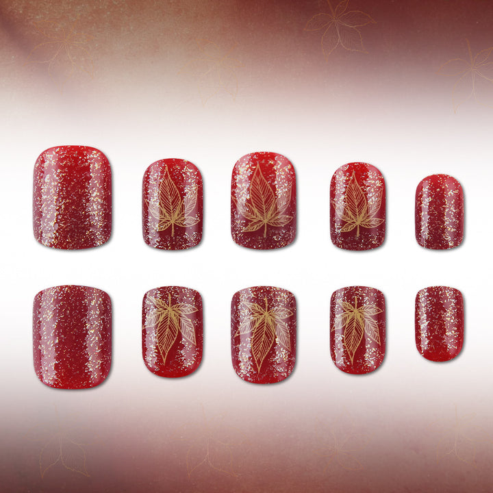 Artistic Leaf-Embellished Nail Art Design Kalsten