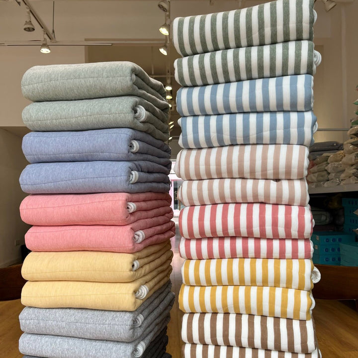 Quilted all-season duvet made of cotton blend fabric with fine cord texture