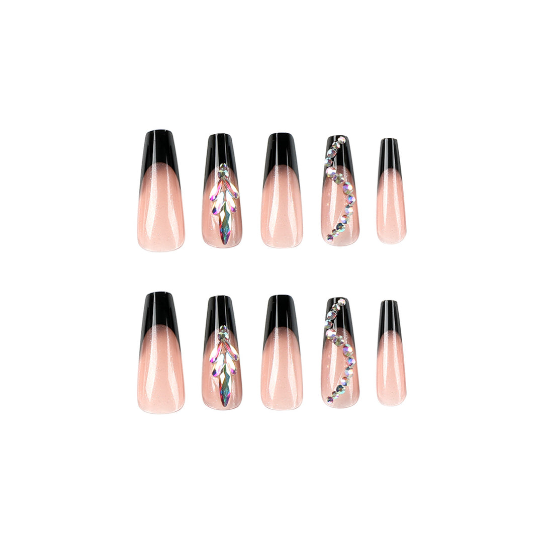 Artistic stiletto nails with glitter embellishments Kalsten