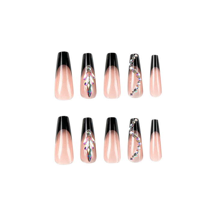Artistic stiletto nails with glitter embellishments Kalsten