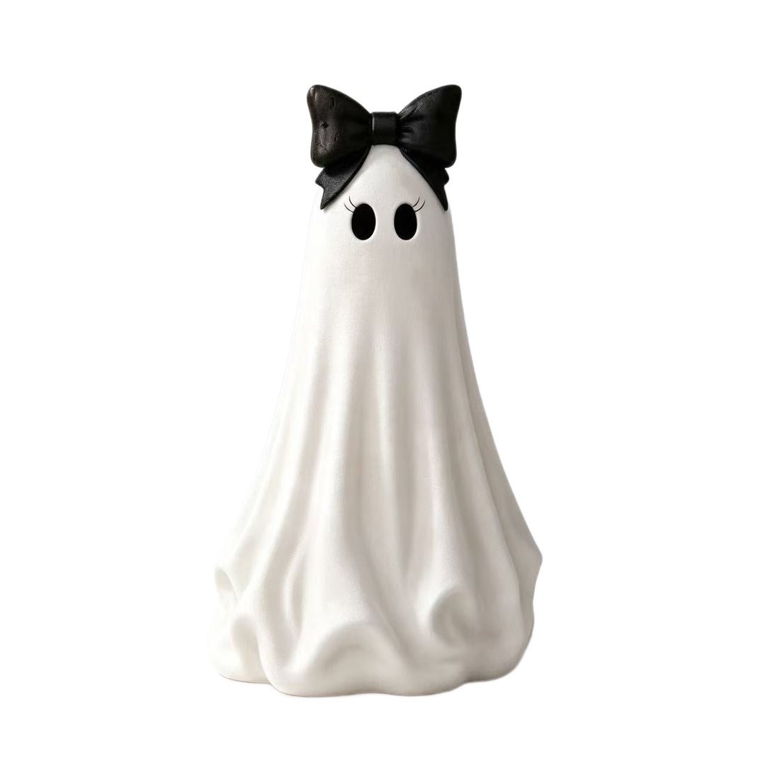 Playful ceramic decorative figure in ghost form with bow detail
