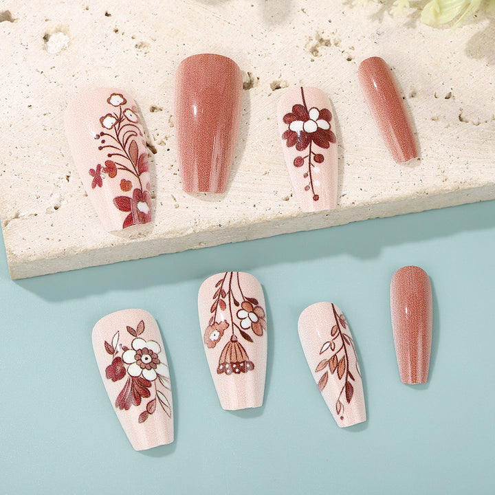 Artificial nails with filigree flower designs Kalsten