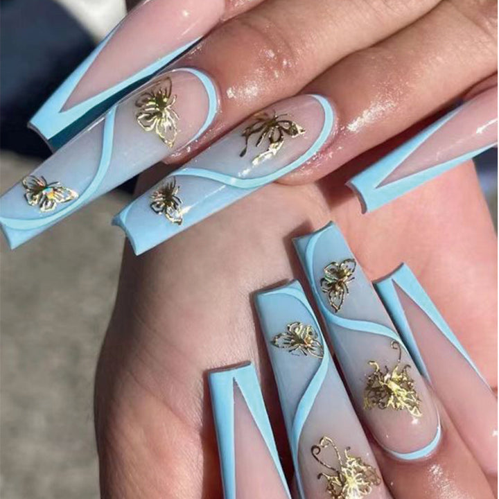 Artificial nail extensions in an elegant style with floral design Kalsten