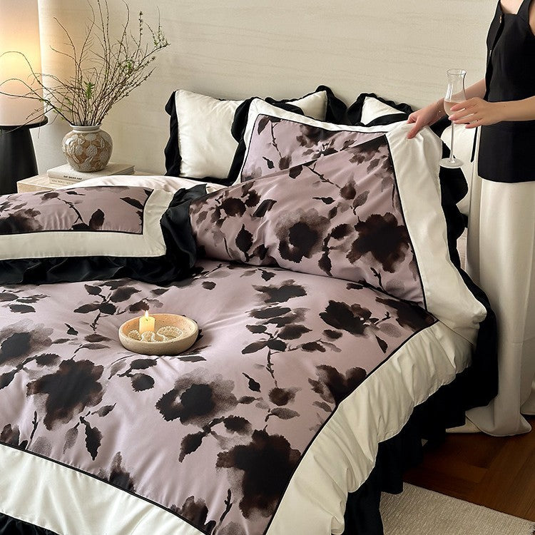 Luxury bed cover set made of cotton satin with abstract watercolor flower print and contrasting ruffle