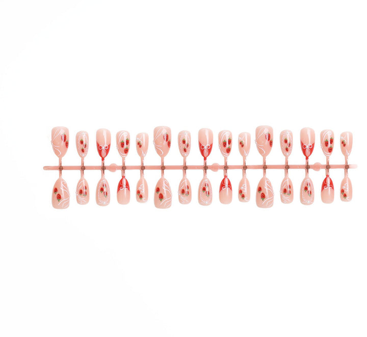 Artificial nail set with romantic strawberry and bow motifs Kalsten