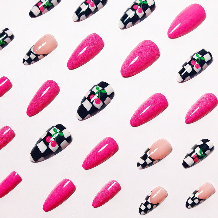 Creative artificial nails with playful cherry and checkerboard design Kalsten