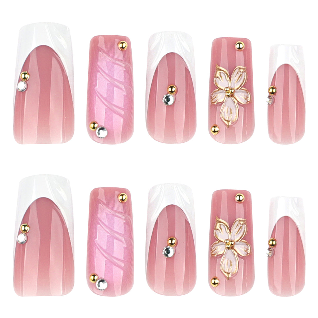 Glamorous gel nails with floral accent and glitter details Kalsten